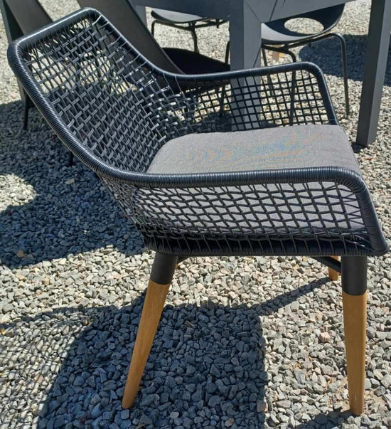 Outdoor Chair. All Weather Wicker. Teak Legs. Price EACH. 4 Available.