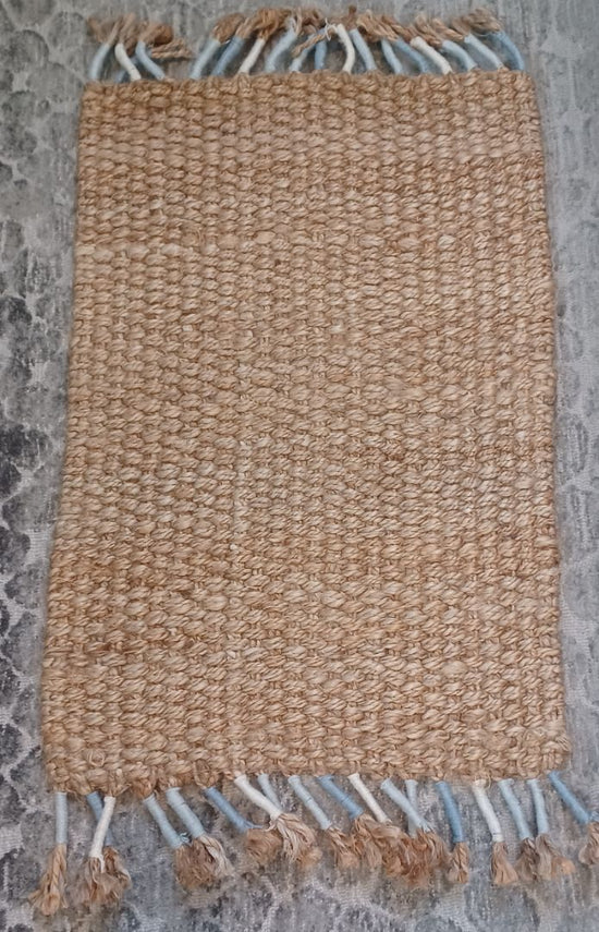 *Fringed Jute Mat by Serena & Lily. Staging Item.