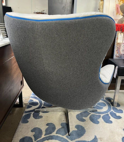 EQ3 Swivel Chair. Light Gray Leather Front. Charcoal back