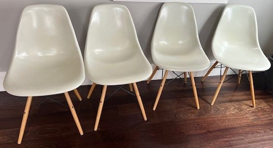 Eames Molded Fiberglass Side Chairs. SET OF 4.