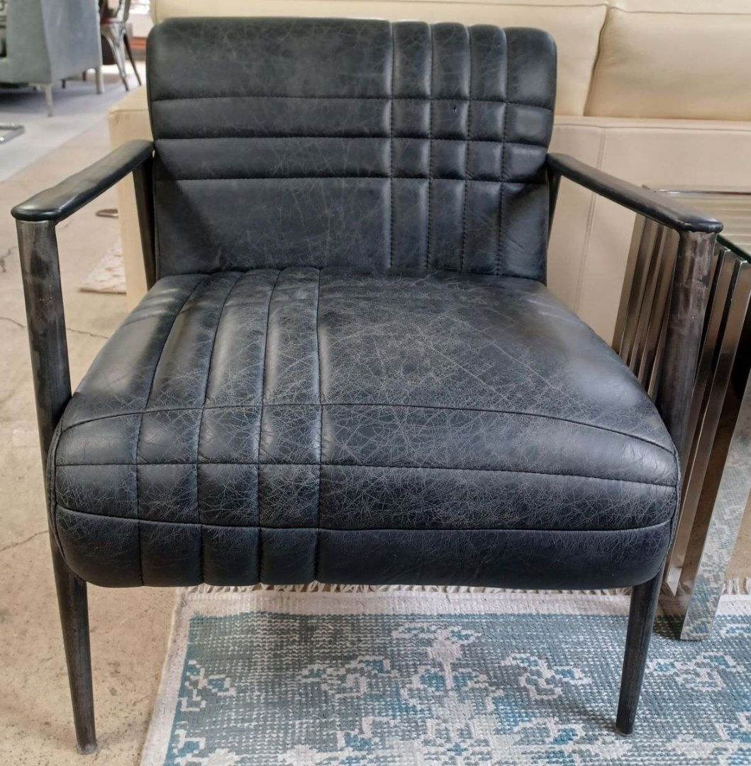 Summer House  Channeled Back Leather Chair. Tubular Base/ Arms