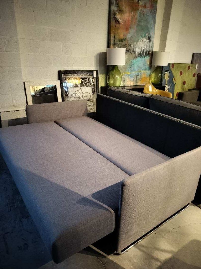 CB2 Sofa Bed in Gray Fabric. Chrome Base.