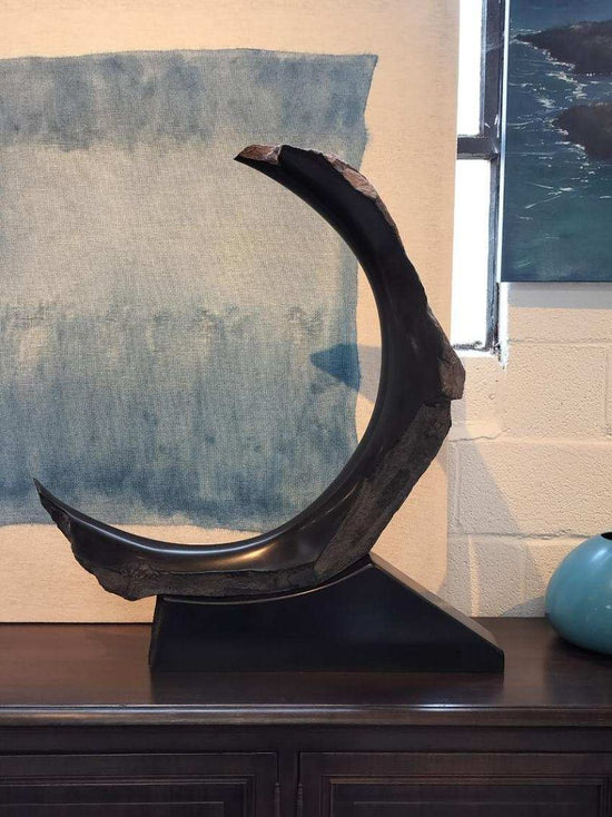 "Nuova Luna" by Sculptor James LaFemina. Black Marble.