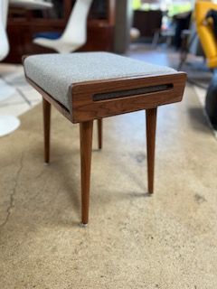 **Custom walnut stool/ottoman with a wool cushion