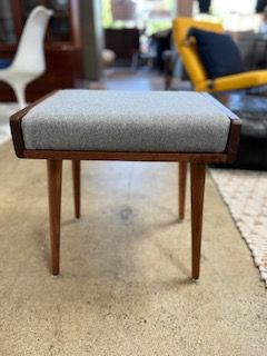 **Custom walnut stool/ottoman with a wool cushion